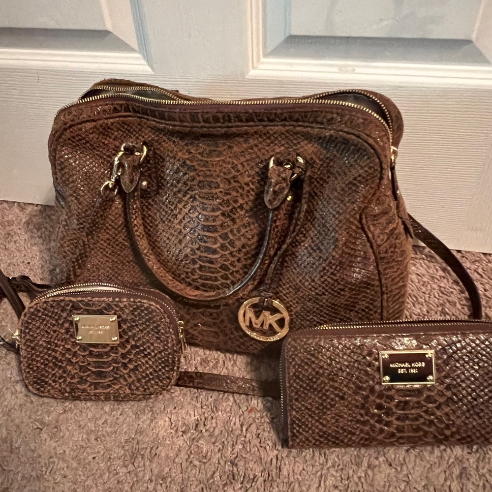 Michael Kors purse wallet and makeup bag.